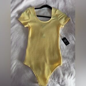 Express women’s Ribbed Short-Sleeve One-Piece Bodysuit in Yellow